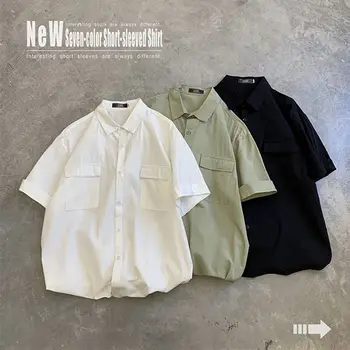 

2020 summer thin Korean version of the tooling style solid color trend half-sleeved student loose middle-sleeved shirt