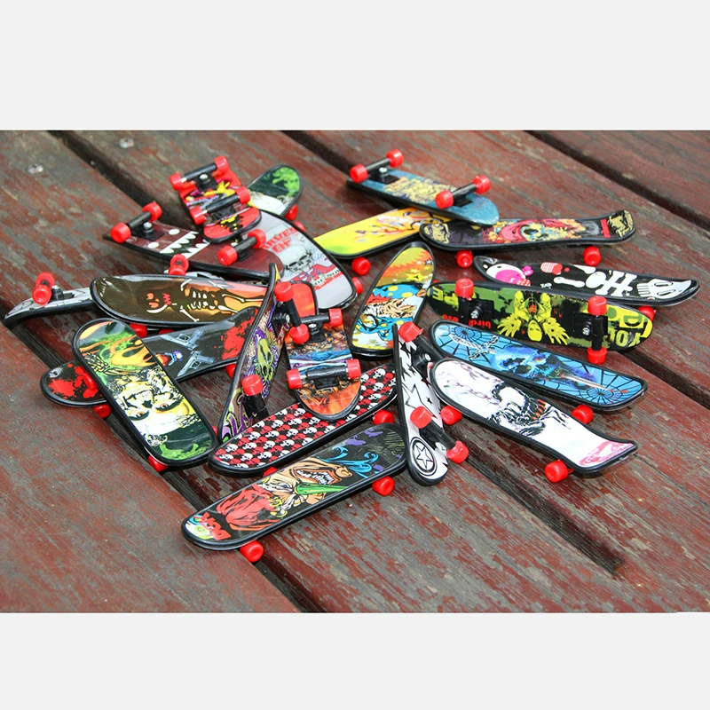 4pcs-set-Random-Colored-Creative-Cartoon-Small-Plastic-Finger-Skateboards-Kids-Adult-Educational-Toys-Birthday-Gifts (2)