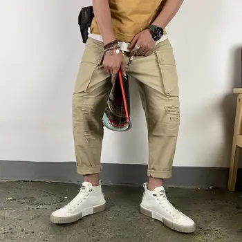 

Men's casual pants 2020 spring and summer new American tooling patch hole wild nine-point pants youth fashion men's clothing