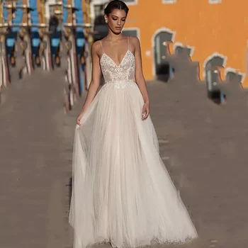 

Vestido De Noiva Boho Wedding Dress Sexy Beach Bridal Dress Backless Spaghetti Straps V Neck 2020 Modest Illusion Wedding Gowns
