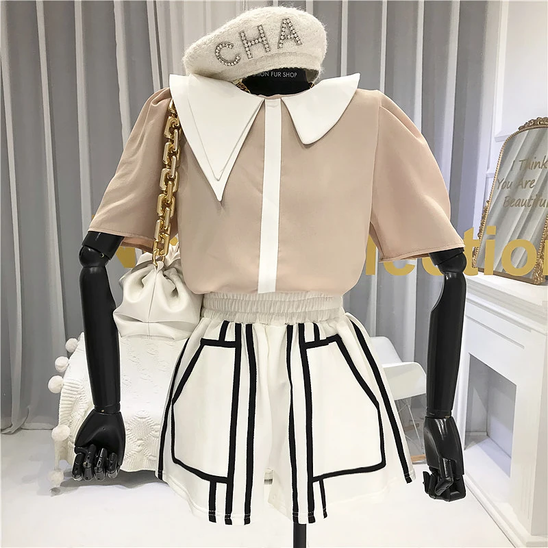 

2020 Summer New Irregular Lapel Contrasting Color Loose Shirt Female Temperament Bubble Short Sleeve Top Blouse Blusas Mujer