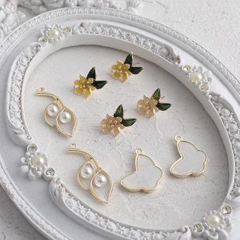 

Retro oil drop flower earrings white pearl calla lily butterfly pendant DIY handmade jewelry earrings accessories material 4pcs
