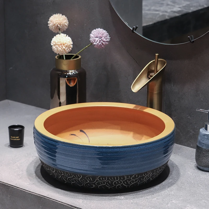 

Oval shape Porcelain China Classic Art lotus bathroom sinks ceramic wash basin countertop basin