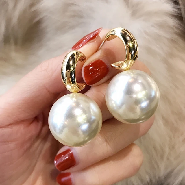 Kinjal in Big Pearl Statement Studs - White. Buy Earrings Online Cheap,  Jhumka Earrings Online Shopping, Big Pearl Studs - Shop From The Latest  Collection Of Earrings For Women & Girls Online.