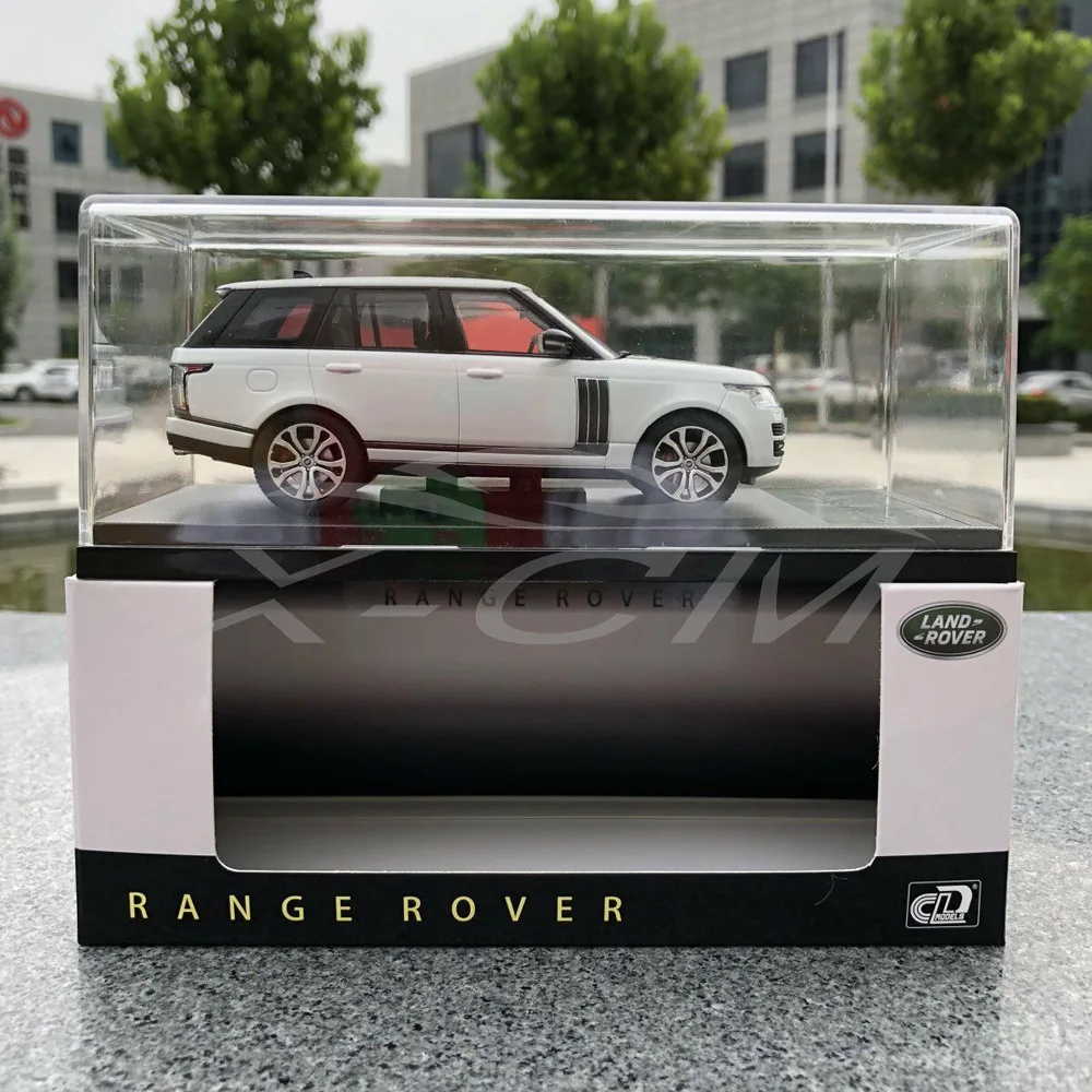 Модель автомобиля ЖК Модели Range Rover 1:43(белый)+ маленький подарок