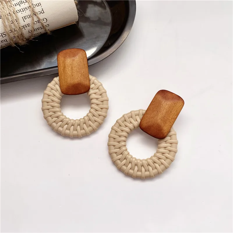 

Korean temperament simple wooden geometry round elegant girl ins wind small personality stud