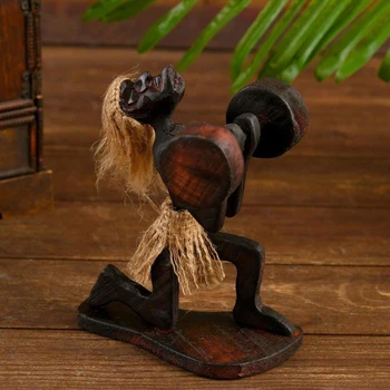 

Souvenir tree "Aboriginal weightlifter" 20x18x11 cm