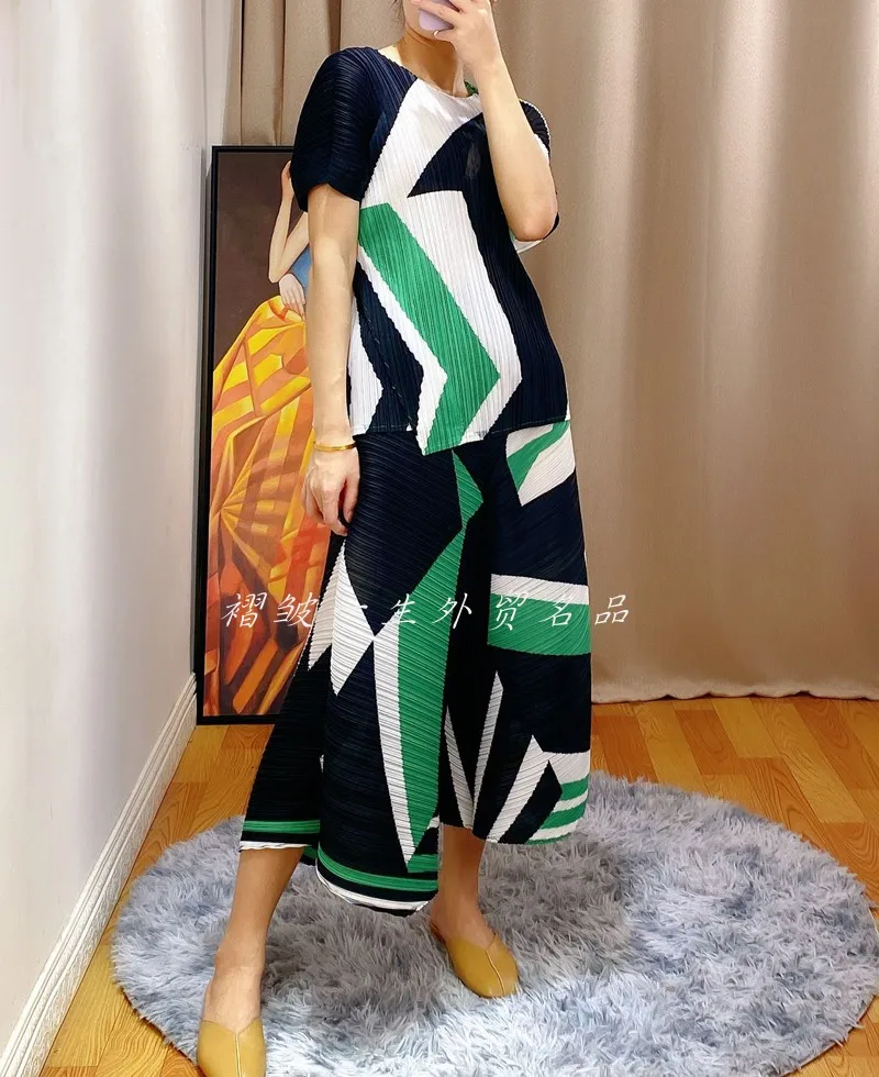 2020 summer women's new irregular tops Miyak fold