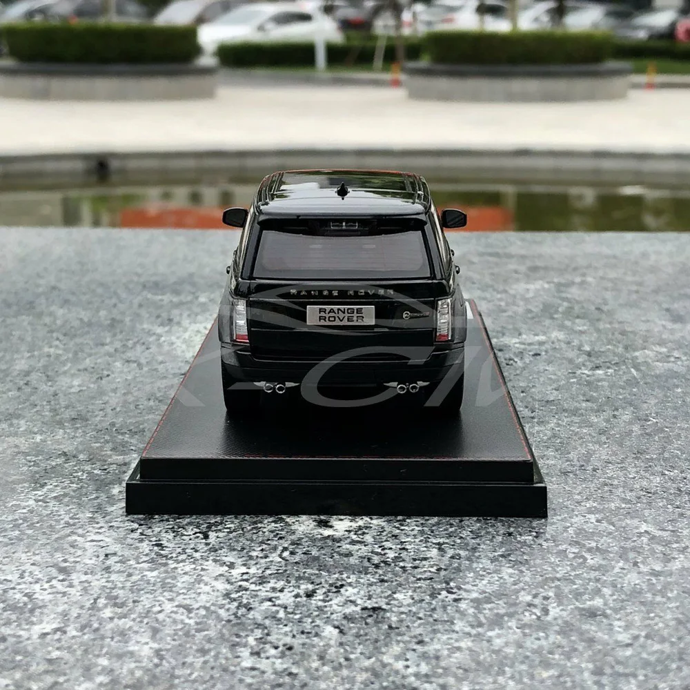 Модель автомобиля ЖК Модели Range Rover 1:43 (черный) + маленький подарок!| |