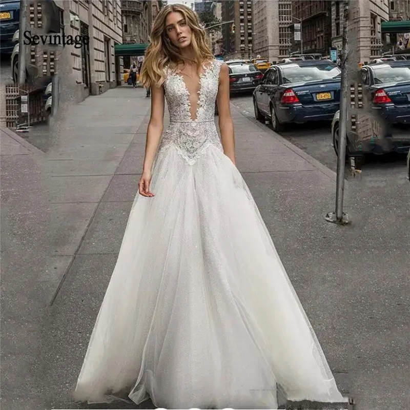

Sevintage 2020 Deep V Neck Lace Appliques Wedding Dress Plus Size Beaded Pearls Baackless Beach Bridal Gowns Bohemian