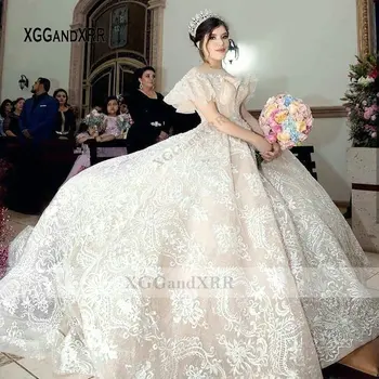 شراءفساتين أنيقة 2021 على شكل كرة شامبانيا من الدانتيل Quinceanera فاخرة ومزينة بالخرز وأكمام طويلة لحفلات التخرج