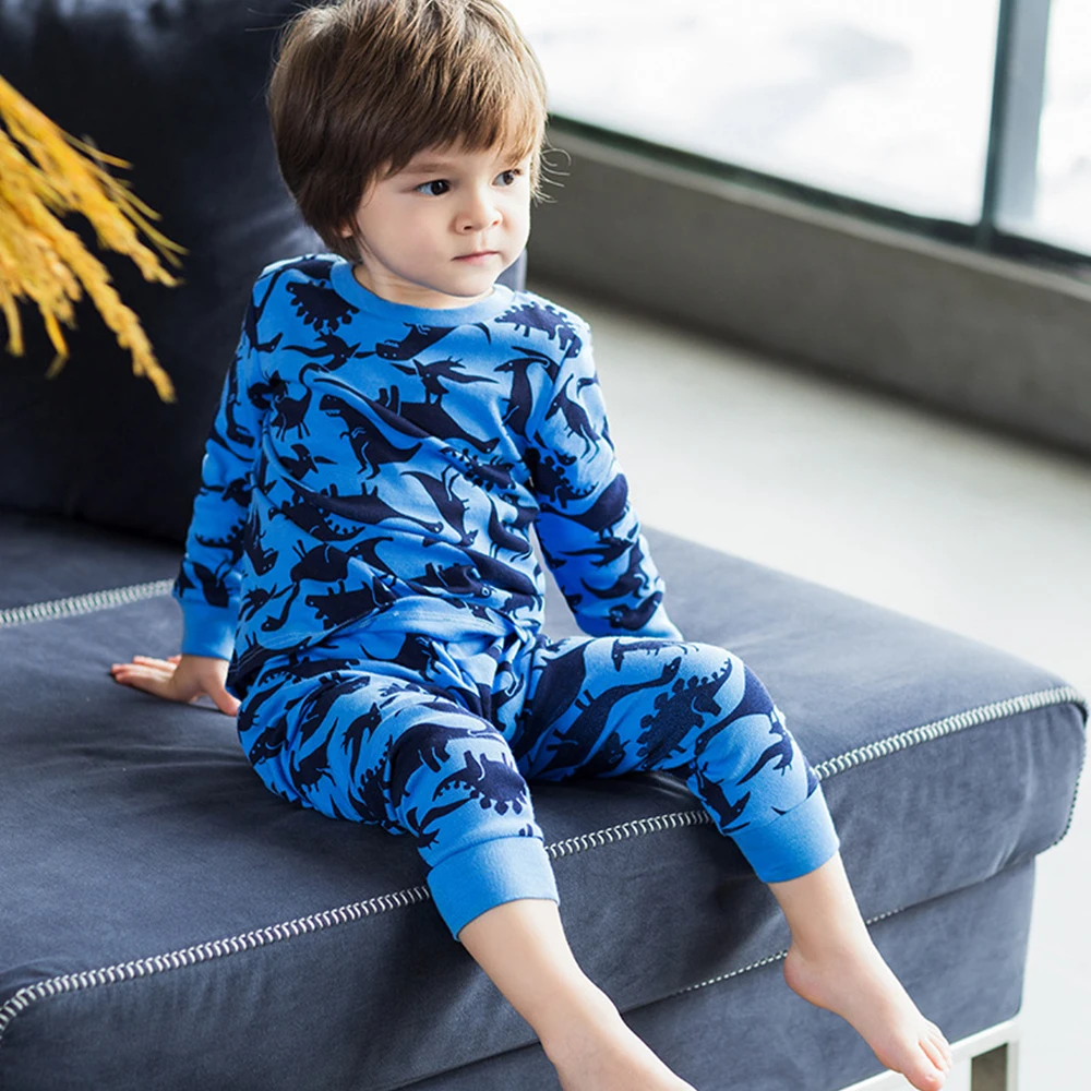 Conjunto de pijama para niños con diseño de dinosaurio que brilla en la oscuridad para niños pequeños Pjs 100% algodón ropa de dormir de manga larga ropa de dormir de 2 piezas de 1 a 10 años 