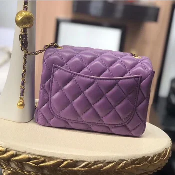 

Classic fashion sheepskin embroidery package round ball collocation to show the trend with a mobile phone zipper