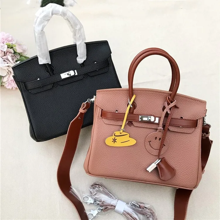

2020 Litchi Grain Head Layer Cowhide Joker Women's Genuine Leather Hand Single Shoulder Bag Chao