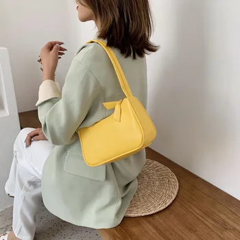 

Small yellow bag 2020 summer new niche design retro simple armpit bag portable small bag baguette