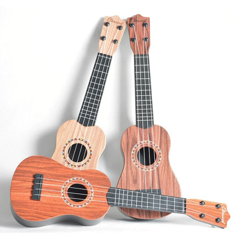 Simulation Forme Ukulele Guitare Ronde en Plastique Instrument De Musique Jouet Guitare Acoustique Le Développement des Jeunes Jouets Activité pour Enfants Jaune 