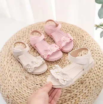

Top Selling Children's flowers pearl sandals summer new girls solid color soft bottom beach shoes baby toddler shoes