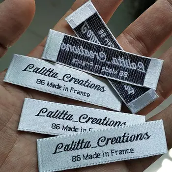 

1000pcs , 1.5 * 6 cm Custom soft white satin ribbon cloth woven label End fold