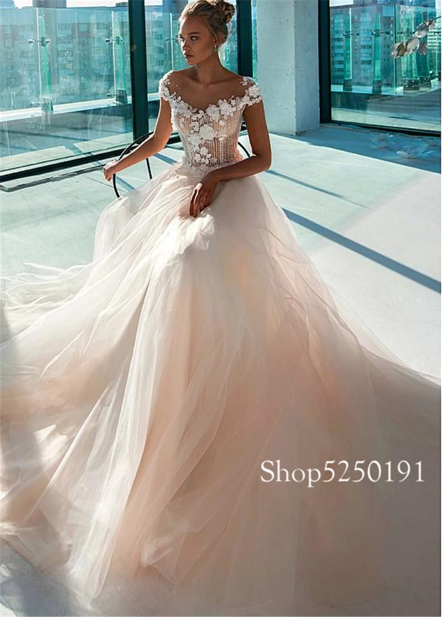 Великолепные Свадебные платья трапециевидной формы с кружевными аппликациями и объемными цветами и бисером цвета шампанского