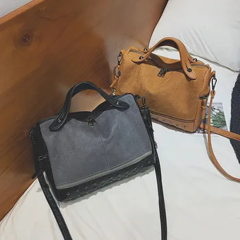 

Hong Kong bag lady 2020 autumn new frosted hand bill of lading shoulder bag personality rivet cross-body bag Boston bag