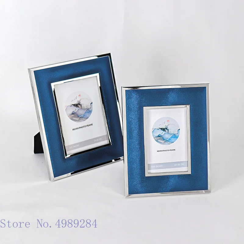 https://ae01.alicdn.com/kf/Hc7b169383e0e4b4882777188933acfc2f/Creativity-Blue-Leather-Photo-Frame-Metal-Frame-Photo-Storage-Display-Desktop-Crafts-Ornaments-Home-Decoration-Picture.jpg