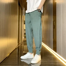 

Summer ultra-thin Chinese style Hong Kong style ice silk disc buckle C beam pants men's quick-drying nine-point men's trousers