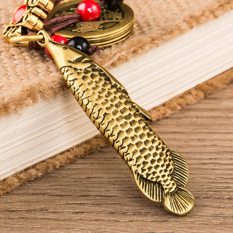 brass fish pendants (12)