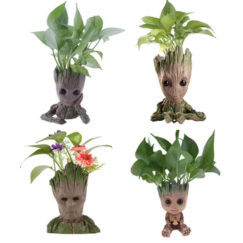 

Baby Cute Action Pencil Pen Holder Flower Pot Hero Model Office Desk Accessories Stationery Storage Organizador Escritorio