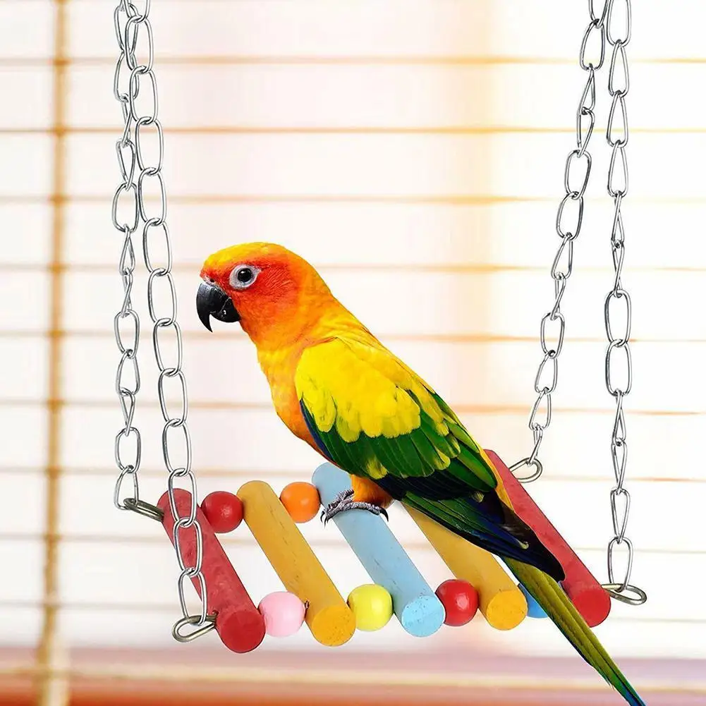 

Cute 8pcs/set Parrot Birds Toy Kit Swing Hanging Bells Accessories Tool Pet Toy Wooden Bridge Standing Bird Training K6V7
