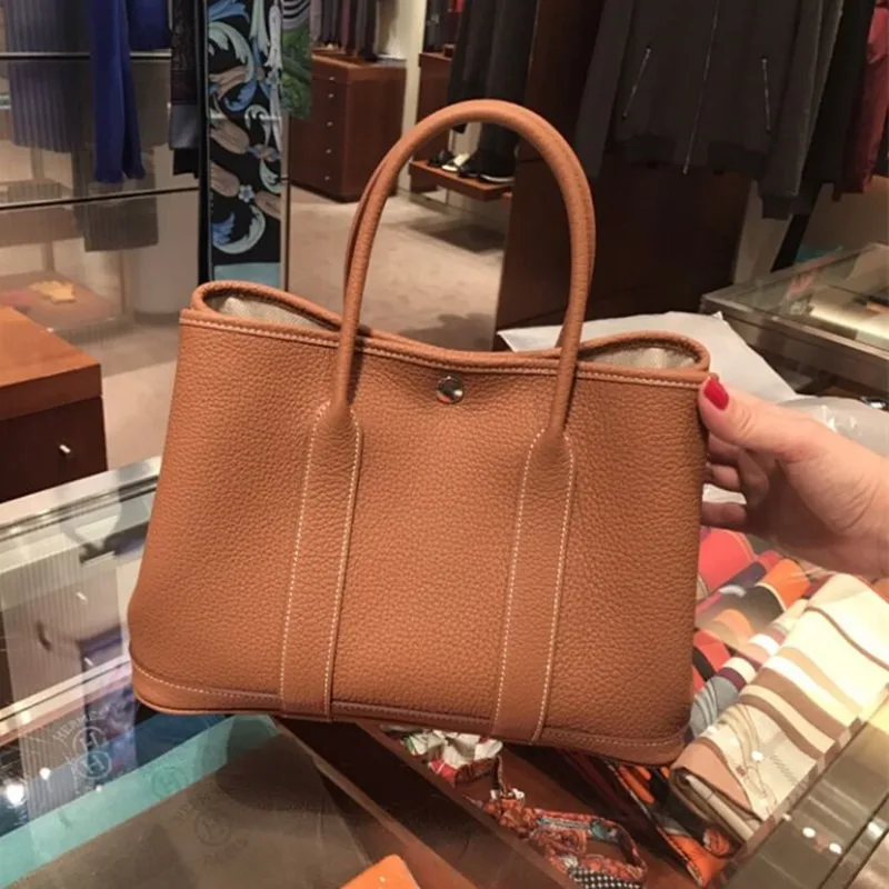 

2019 New Leather Women's Bag Single Shoulder Leaning Simple Garden Bag Handheld Bag