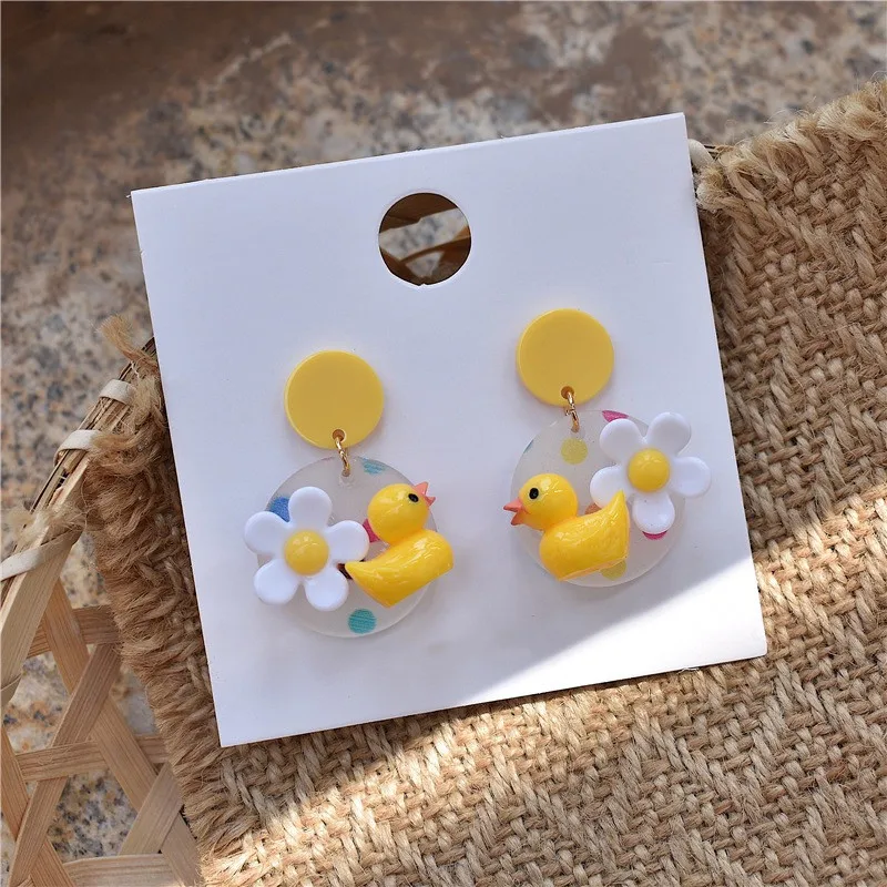 

Cute Yellow Duck White Flower Acrylic Earrings with Hypoallergenic Silver Needle Creative Jewelry Dangle Earrings for women