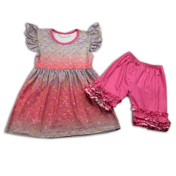

Pink scale printed ruffle tunic top matching icing short girl sets