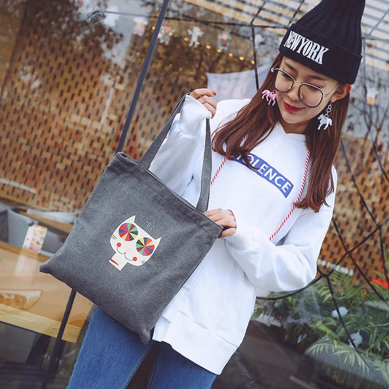 

The new simple Korean canvas bag women's shoulder bag student bag shopping casual bag Joker