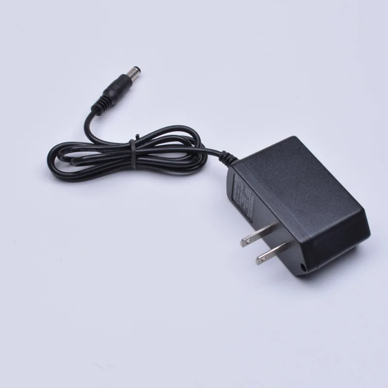

YX 9V0. 6A Power Adapter 9v600 Router Switch Cat Power Supply 5.5*2.5