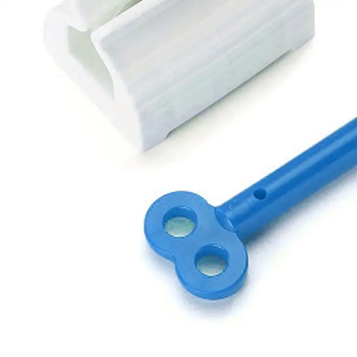Convenient Toothpaste Dispenser Rolling Toothpaste Squeezer Bathroom Blue/Green/Red Stand Holder