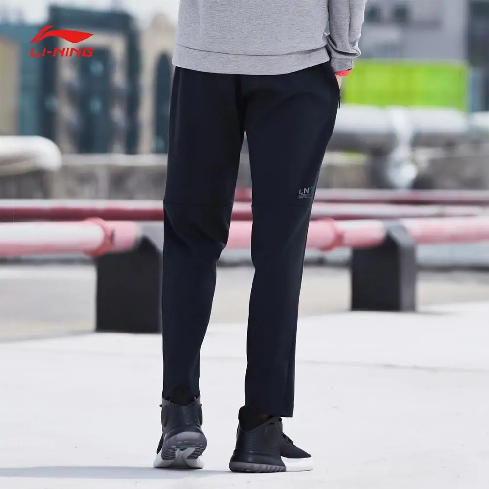 Мужские тренировочные штаны Li Ning спортивные из 74% хлопка 26% полиэстера с