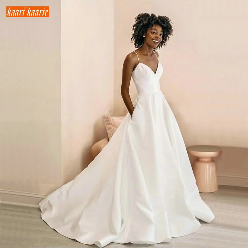 

Romantic White Boho Wedding Gowns V Neck Satin Pockets Spaghetti Straps Bridal Dresses Custom African Women Ivory Wedding Dress
