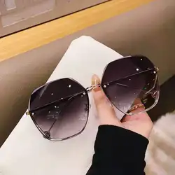 New style frameless irregular cut-edge sunglasses, trendy sunglasses, female big face, thin, fashionable big-frame glasses