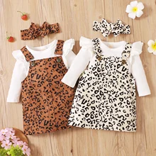 

3Pcs Baby Girls Autumn Casual Cotton Outfits Ribbed Fly Sleeve Round Neck Bodysuit Leopard Print Suspender Skirts Bow Headband