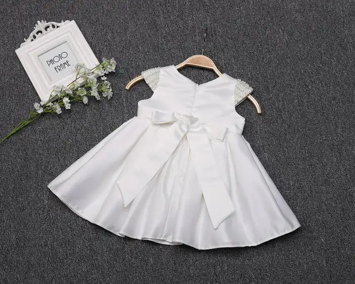 white newborn baby dress