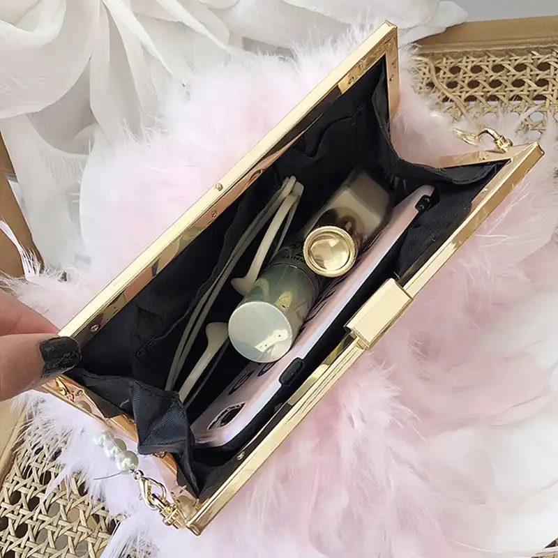 white feather clutch bag