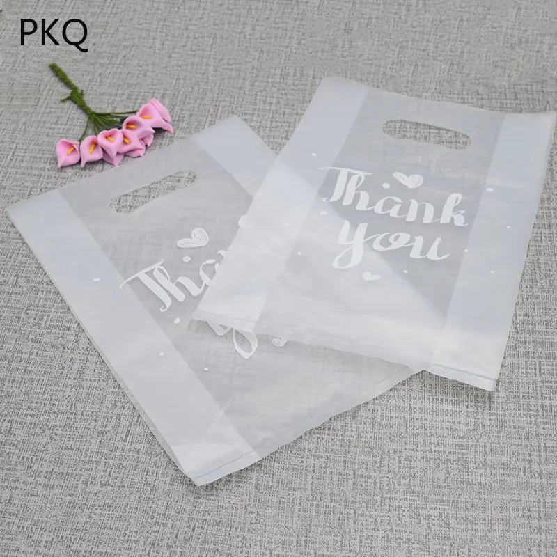 

19*28cm 100pcs Frosted Boutique Cloth Gift Packaging plastic gift bag with handle,thank you printed plastic shopping bag