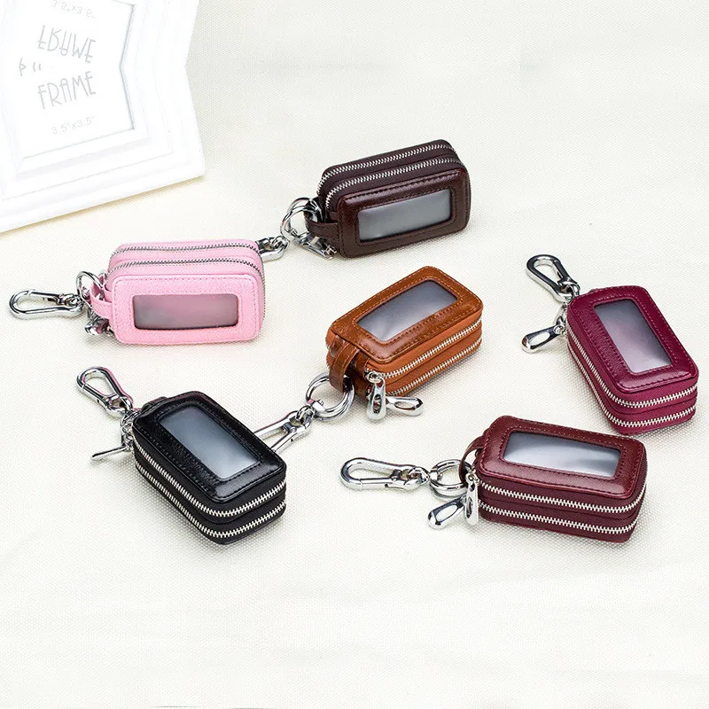 

2019 new Wallet Holder Smart Package smart housekeeper pouch woman men Car Key holder cow Leather Zipper Retro Double Bag Waist