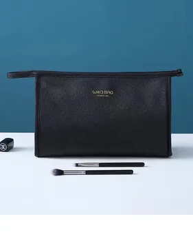 

2020 simple portable storage bag, black triangle cosmetic bag