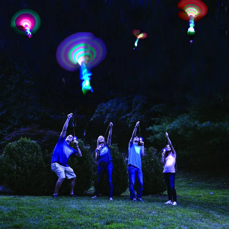 3pcs-lot-Bamboo-Dragonfly-with-light-Shooting-Rocket-Flying-parachute-Sky-UFO-Outdoor-night-game-toy