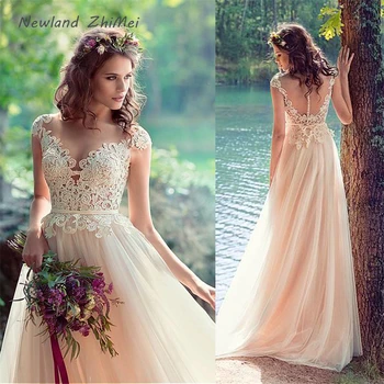 

Charming 2020 A-Line Wedding Dresses With Lace Appliques Cap Sleeve Nude Bridal Gowns See Through Bride Dress