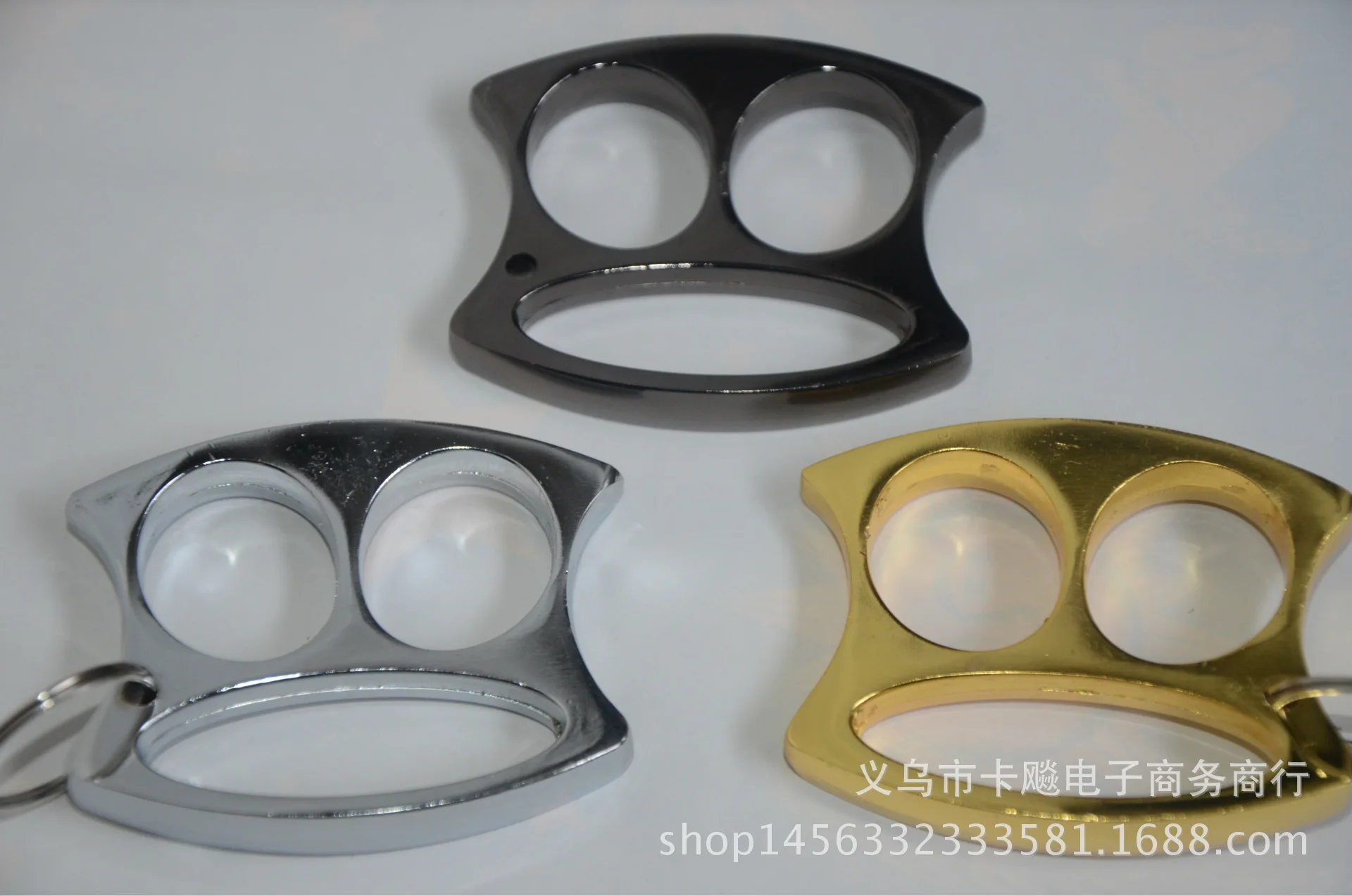 

Defensive Fist Knuckle Weapon Iron Fist Boxing Gloves Finger Lock Case Finger Holder Defensive Weapons Flat Window Breaking Mach