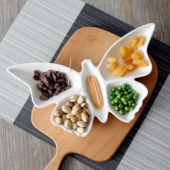 

Dried fruit platter creative ceramic platter shaped Hotel irregular personality butterfly dish rice platter fruit household tabl