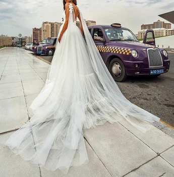 

Lange Tulle Spaghettibandjes Trouwjurken Voor Bruid 2020 V-hals Mouwloze Bruidsjurken Vestido De Noiva