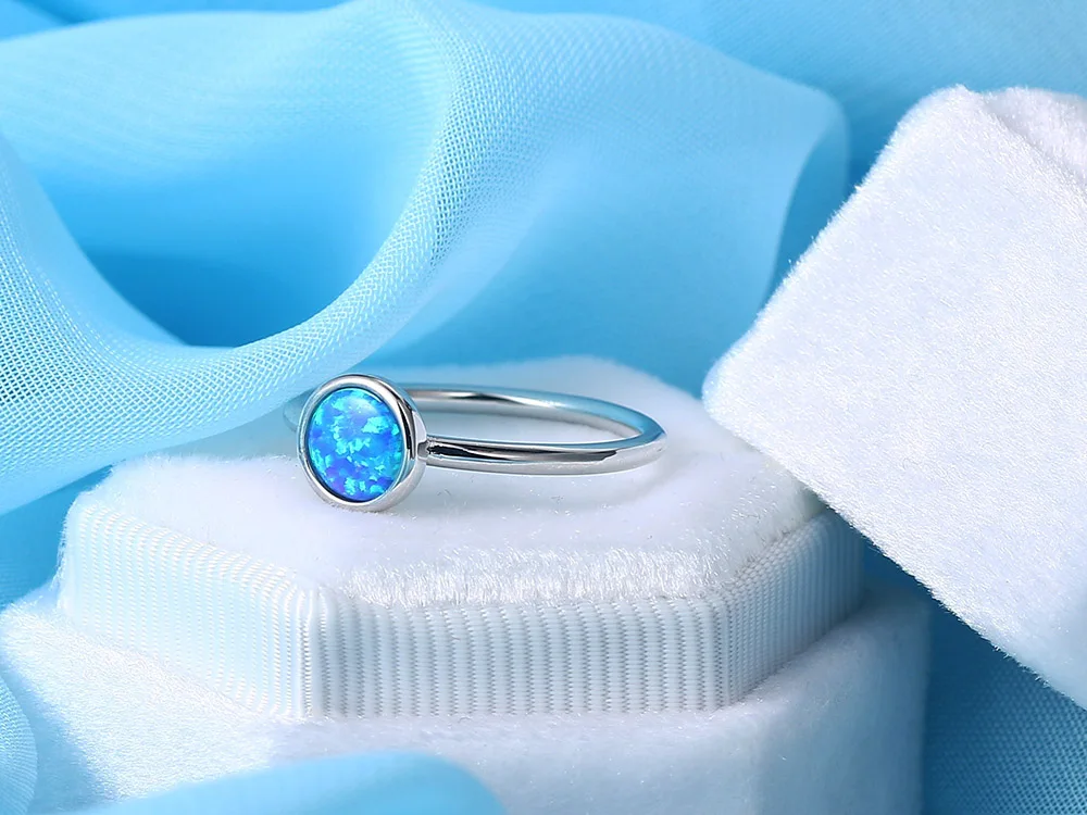 ZHOUYANG Opal Stone Rings For Women Simple Classic Round White Gold Color Party Birthday Gift For Girls Fashion Jeweley DZR032 ZHOUYANG Opal Stone Rings For Women Simple Classic Round White Gold Color Party Birthday Gift For Girls Fashion Jeweley DZR032